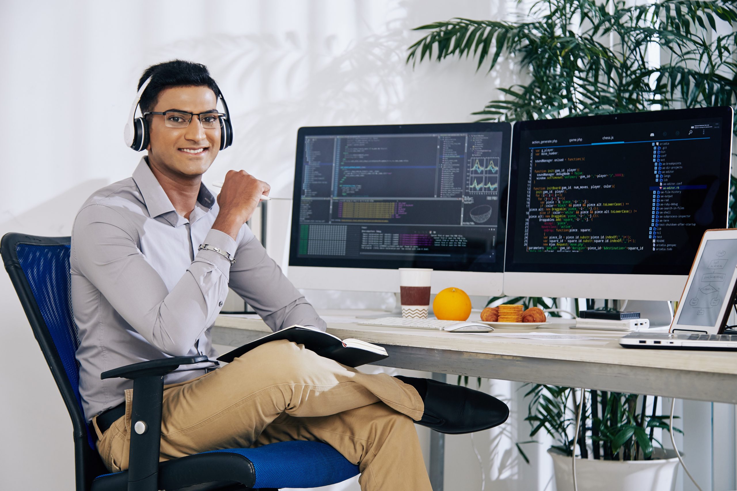 Portrait,Of,Smiling,Confident,Indian,Coder,Sitting,At,His,Office